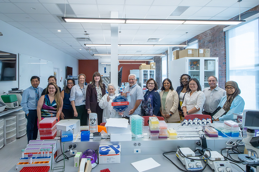 Representatives from MCC and MLSC visit MCC's biotechnology lab.